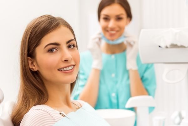 Woman sitting in a dental chair