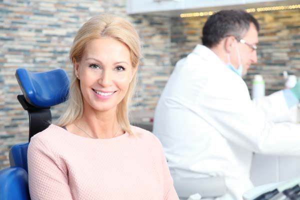 Woman sitting in a dental office