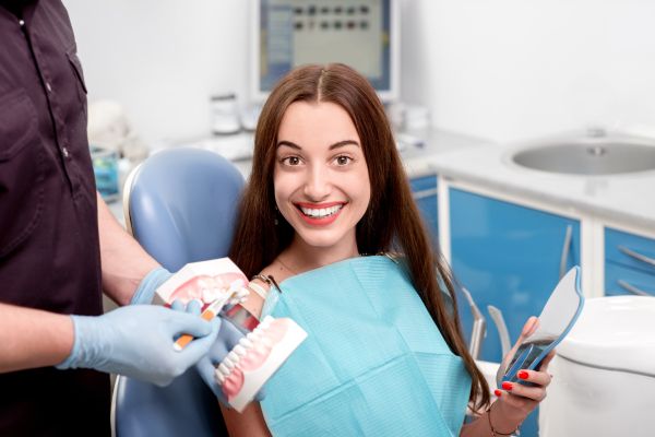 Woman sitting in a dental chair