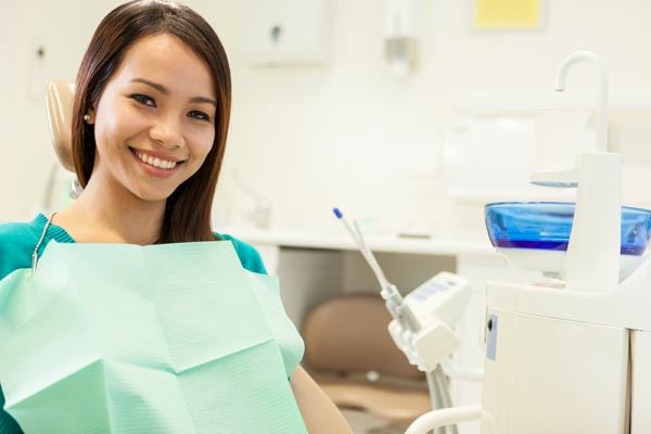 Woman sitting in a dental chair