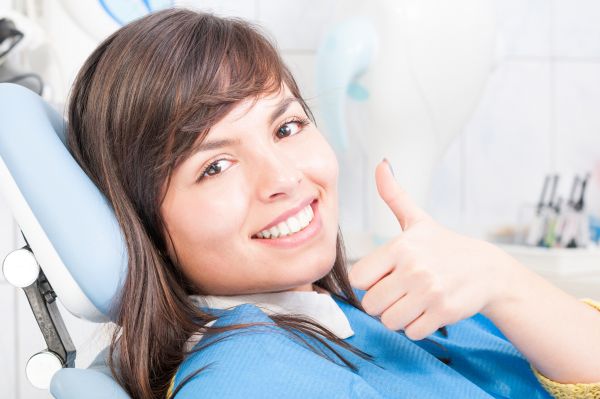 Woman sitting in a dental office