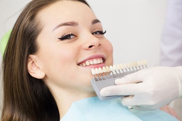 Woman sitting in a dental chair